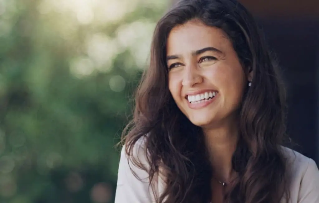 Happy patient after treatment at a well-known dental clinic in Kannur